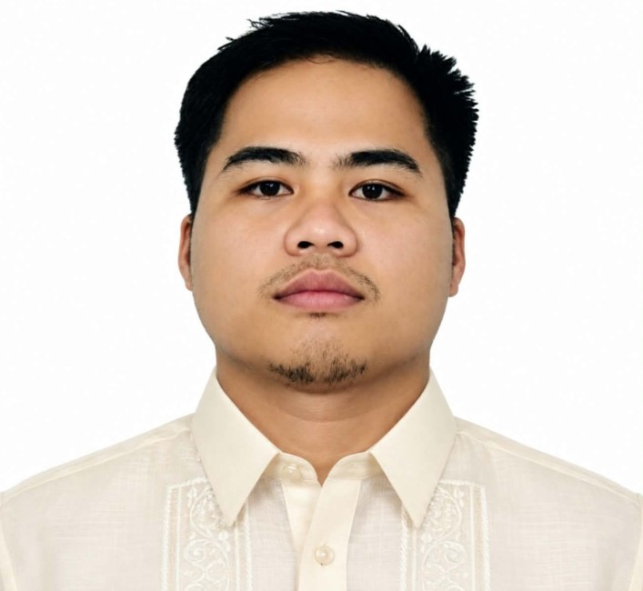 RYAN B. BANAS